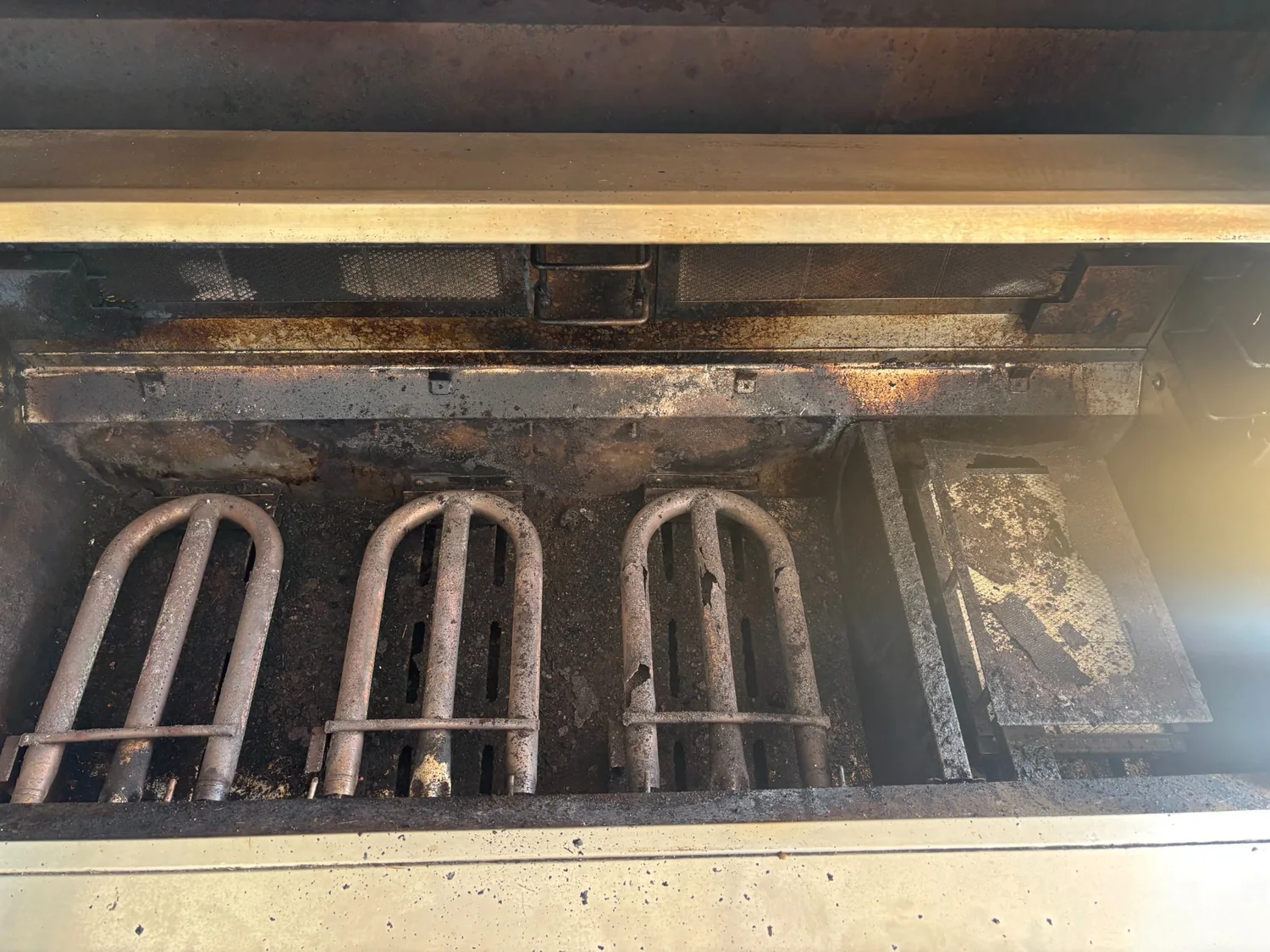 Grill components before detailed cleaning